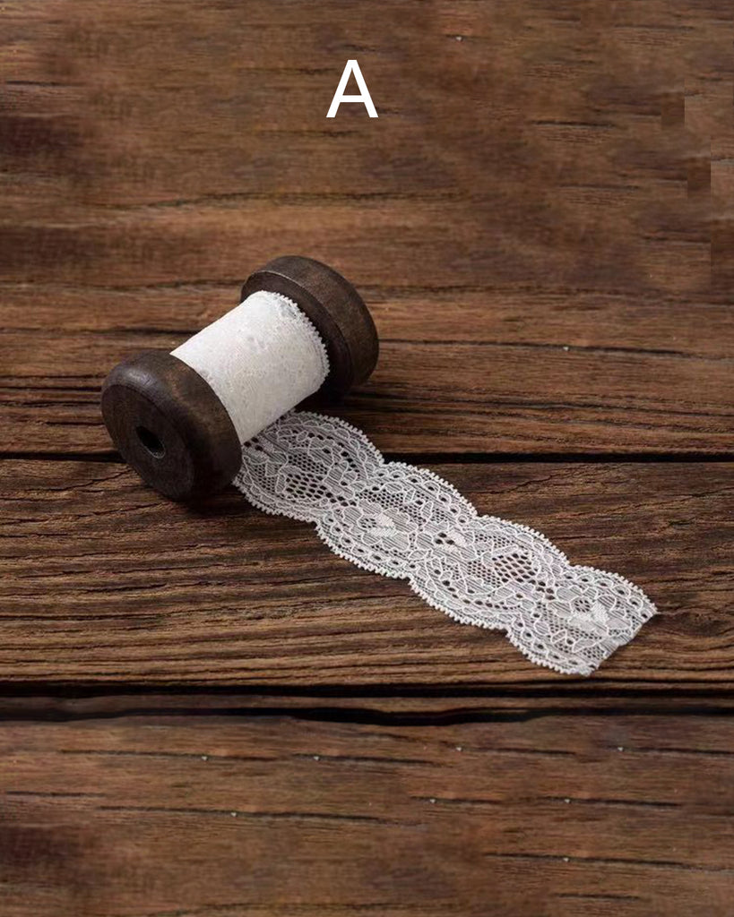 Wooden Spools with lace